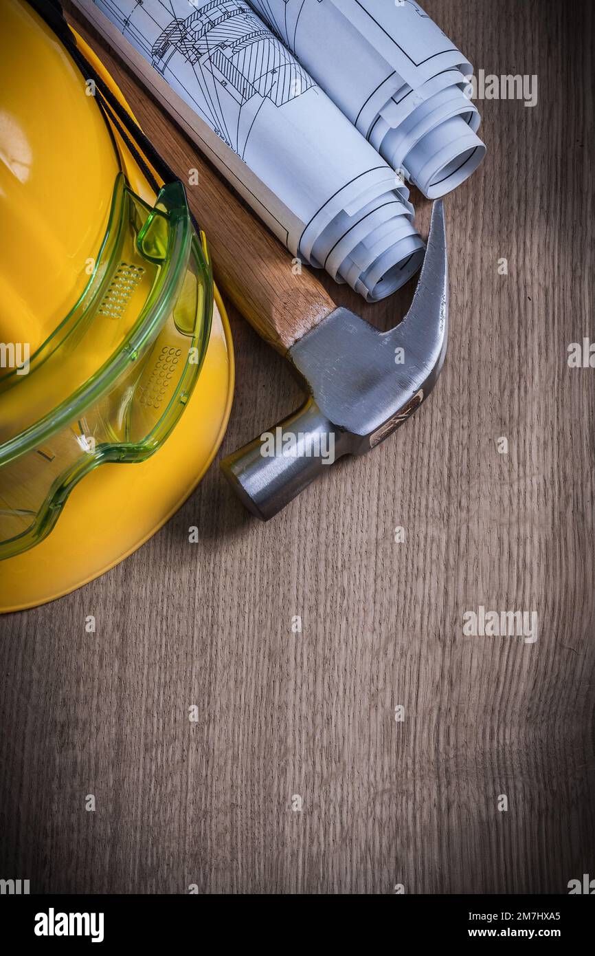 Building helmet rolled blueprints hi-res stock photography and images ...