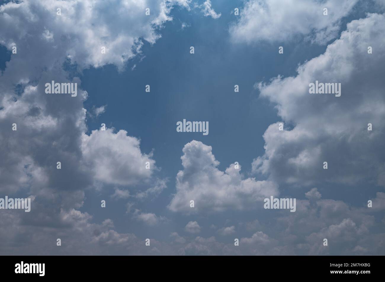 Clouds seen against blue background Stock Photo