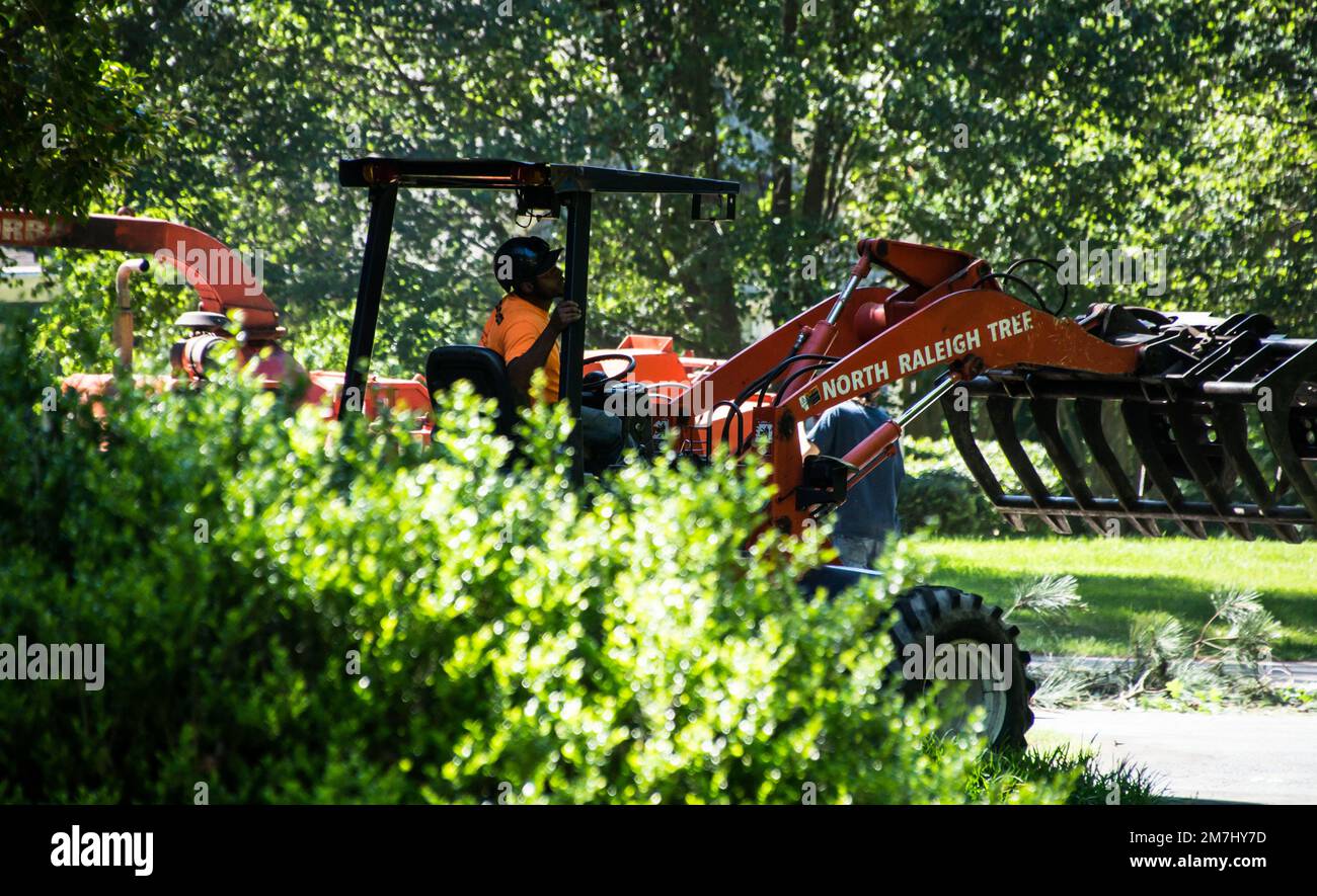 Tree cutter using a Tractor (NC State, May, 2017 Stock Photo Alamy