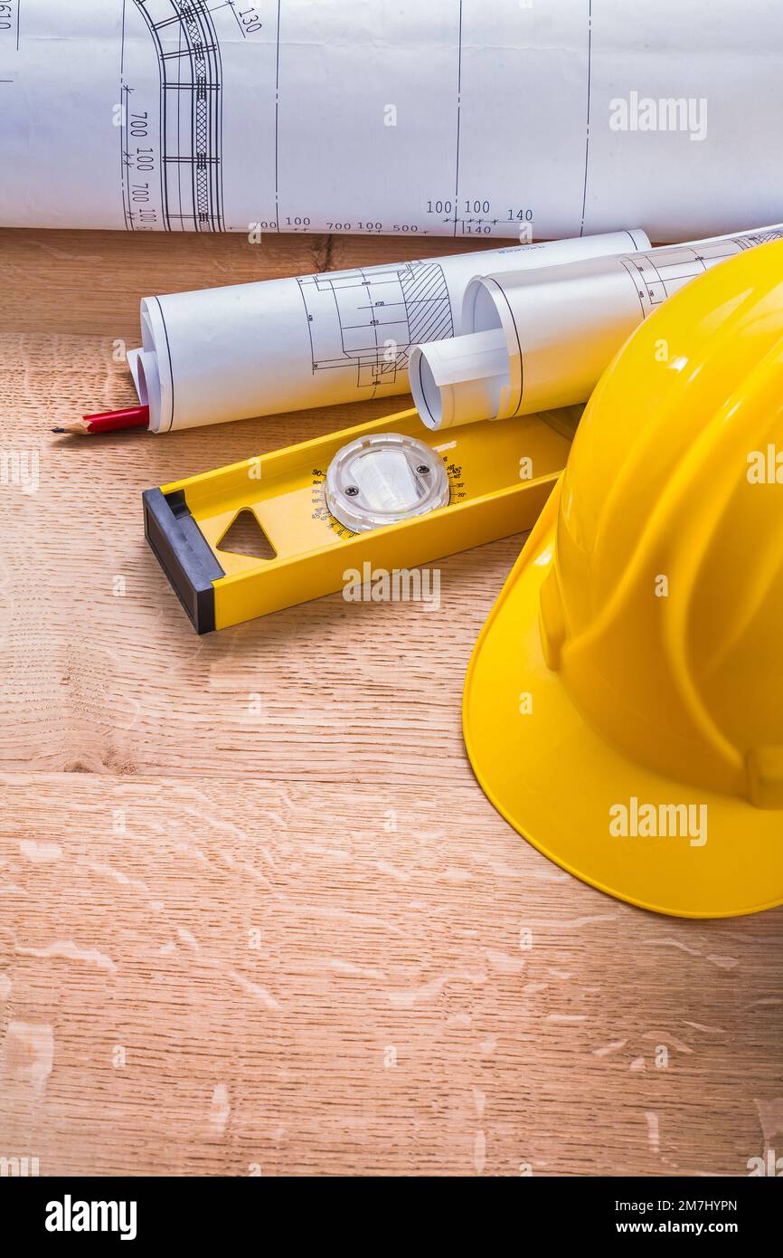 helmet blueprints level pencil on wooden board Stock Photo - Alamy