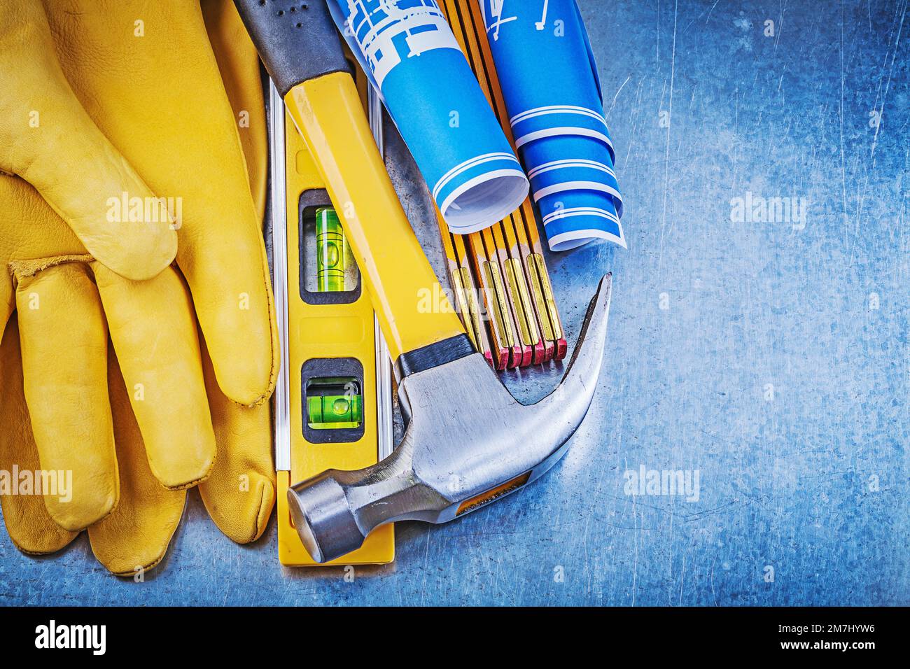 Leather gloves claw hammer blue construction drawings level wooden ...