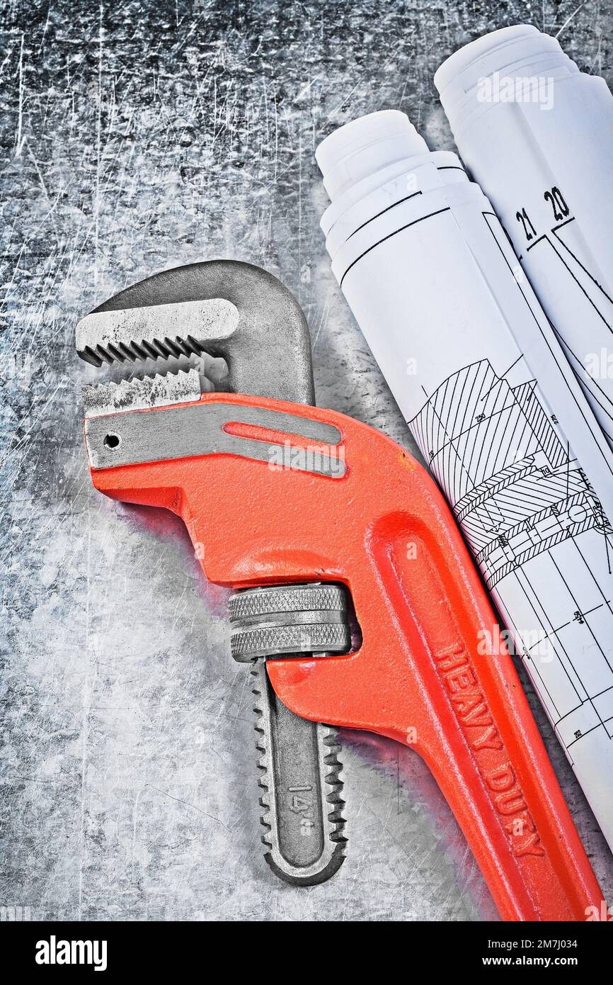 Monkey wrench blueprints on metallic background construction concept. Stock Photo