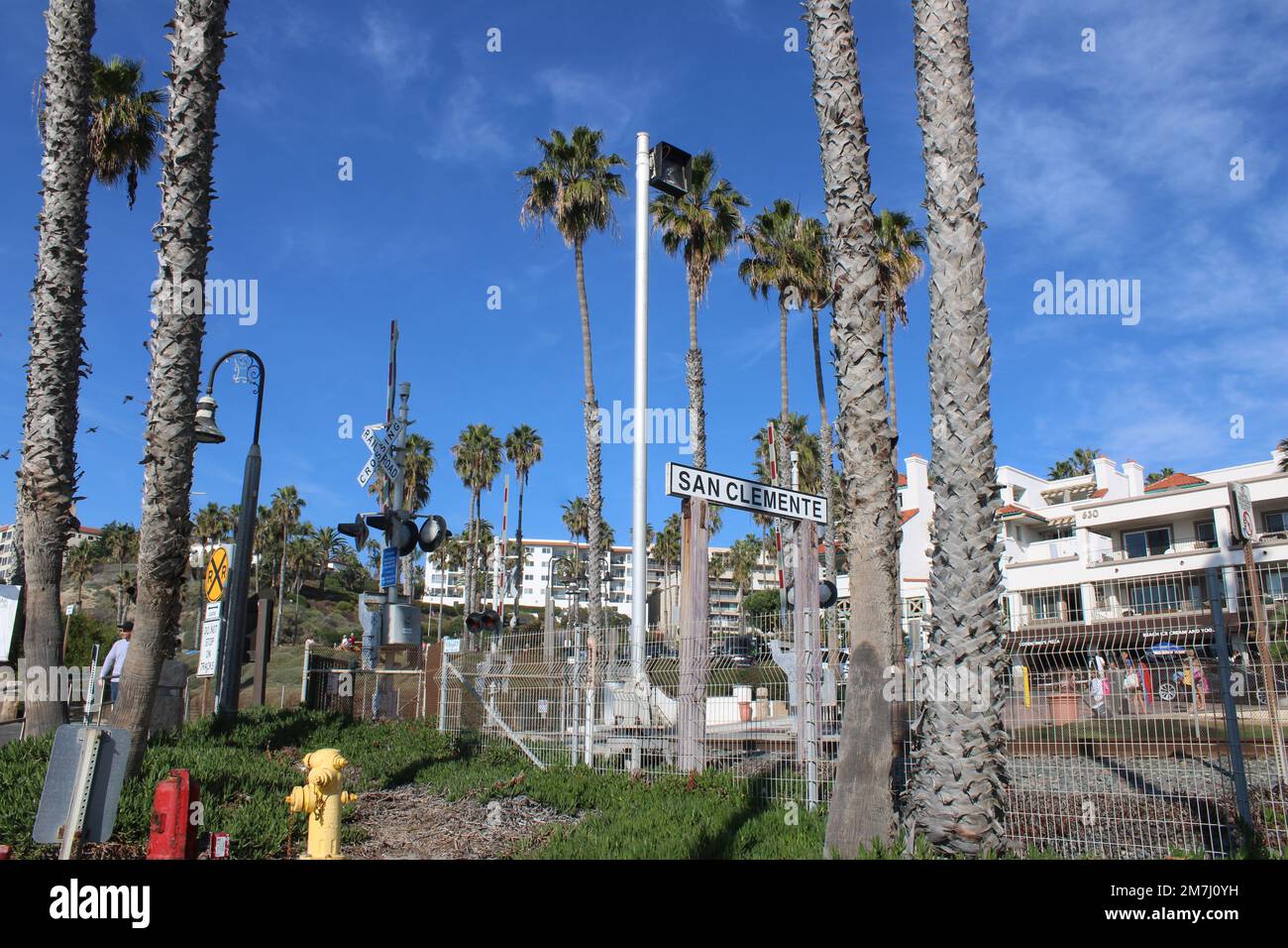 Crossing between San Clemente Station, Beach, and Pier Stock Photo