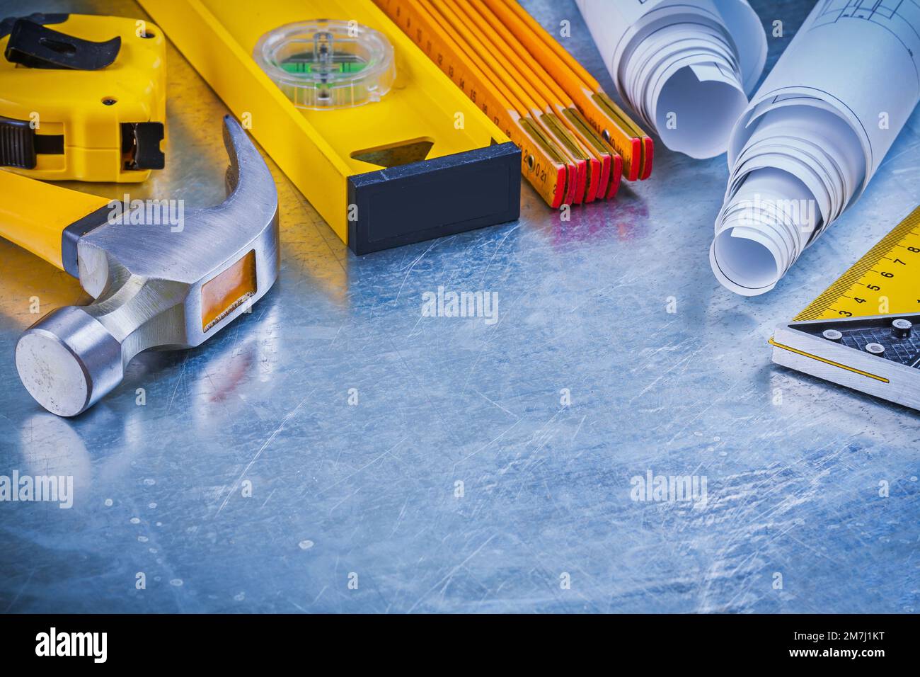 Variation of building working tools on metallic background construction concept/ Stock Photo