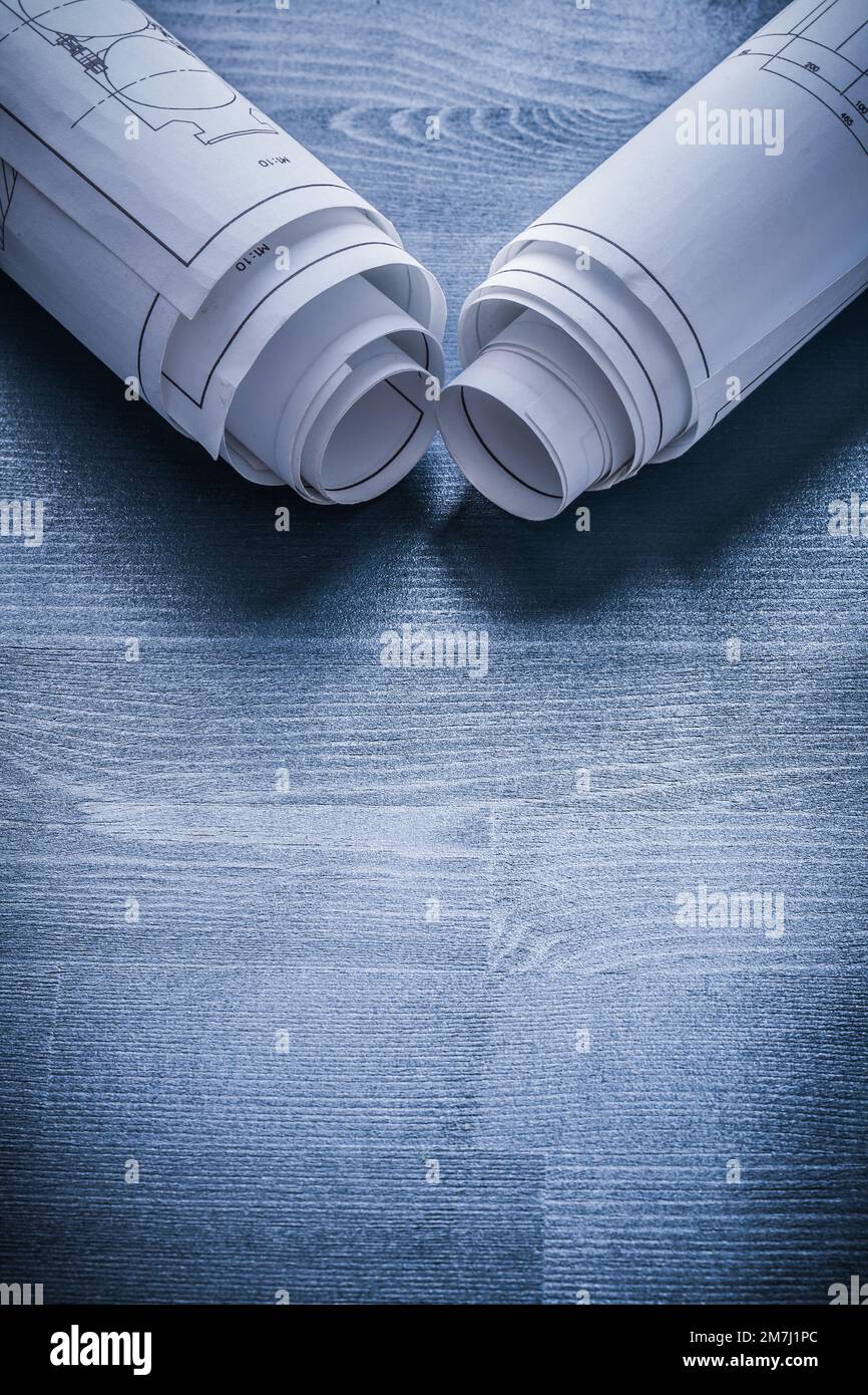 vertical view view on two white rolls of blueprints Stock Photo - Alamy