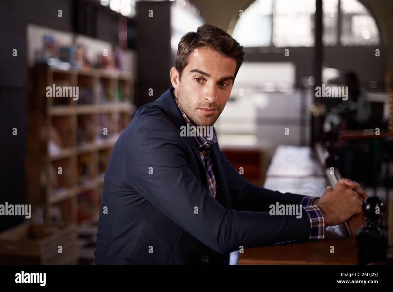 Man sitting at bar counter hi-res stock photography and images - Alamy