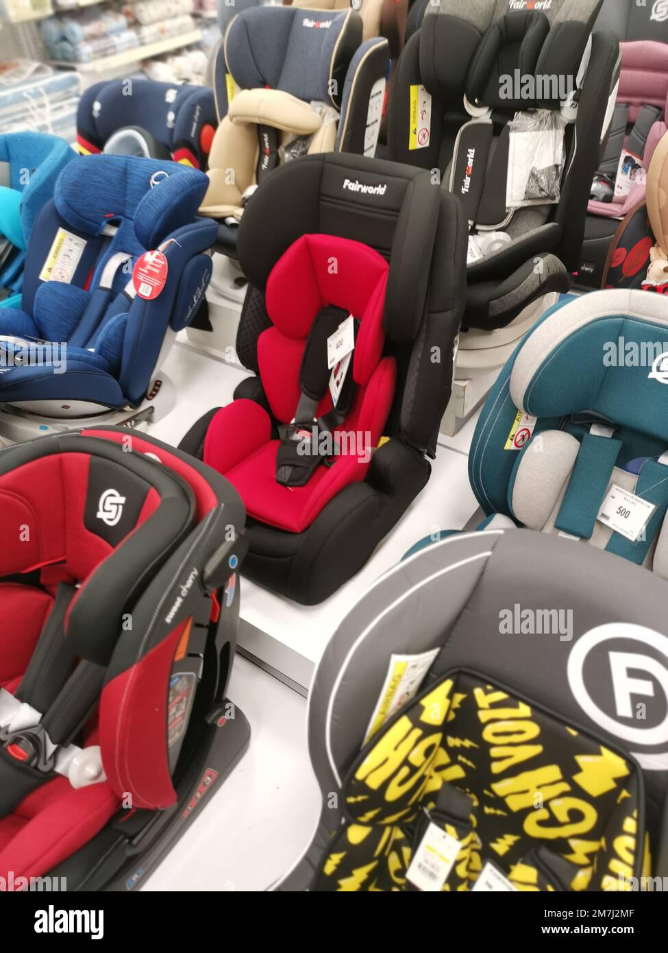 Perak,Malaysia. October 20,2022: Variety of colorful baby carrier cot or basket is exhibited on display and sale at Aeon Supermarket Shopping mall, Sr Stock Photo