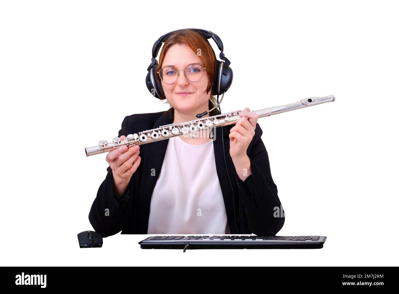 A music teacher provides online training in playing the flute, isolated