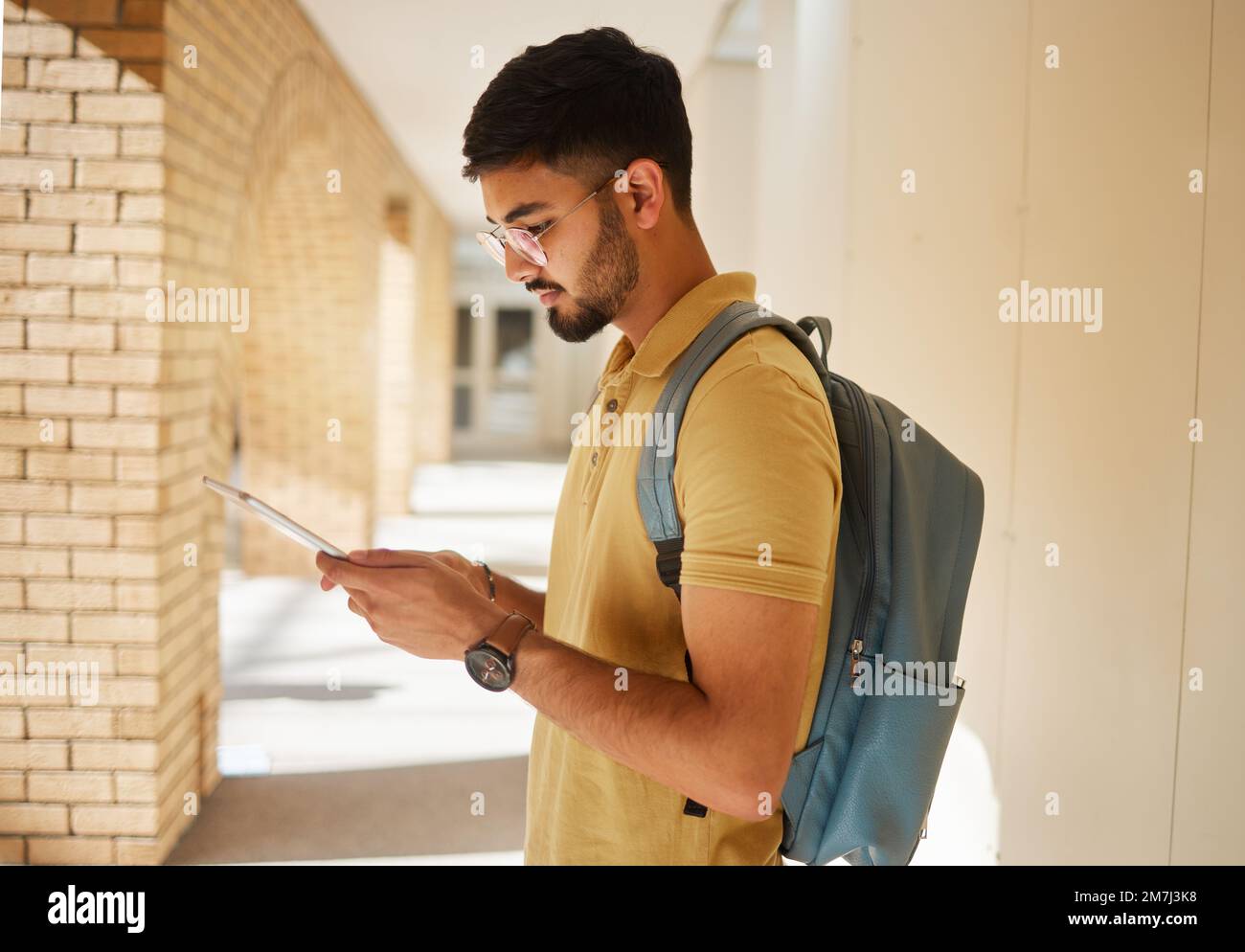 University, tablet and campus student typing internet, web or website search for college, digital research or study project. Education profile, school Stock Photo