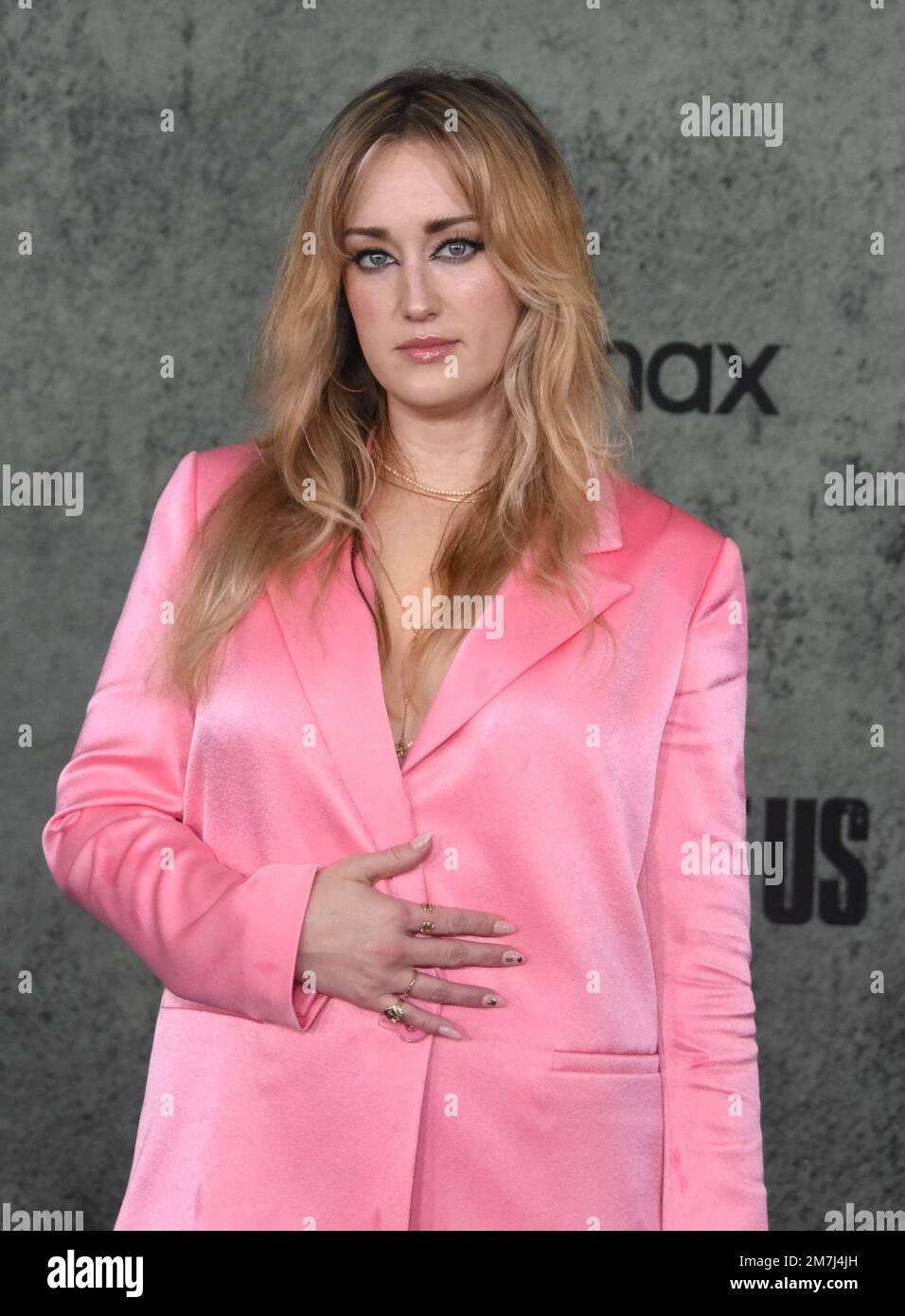 US actress Ashley Johnson poses with her husband on the red carpet