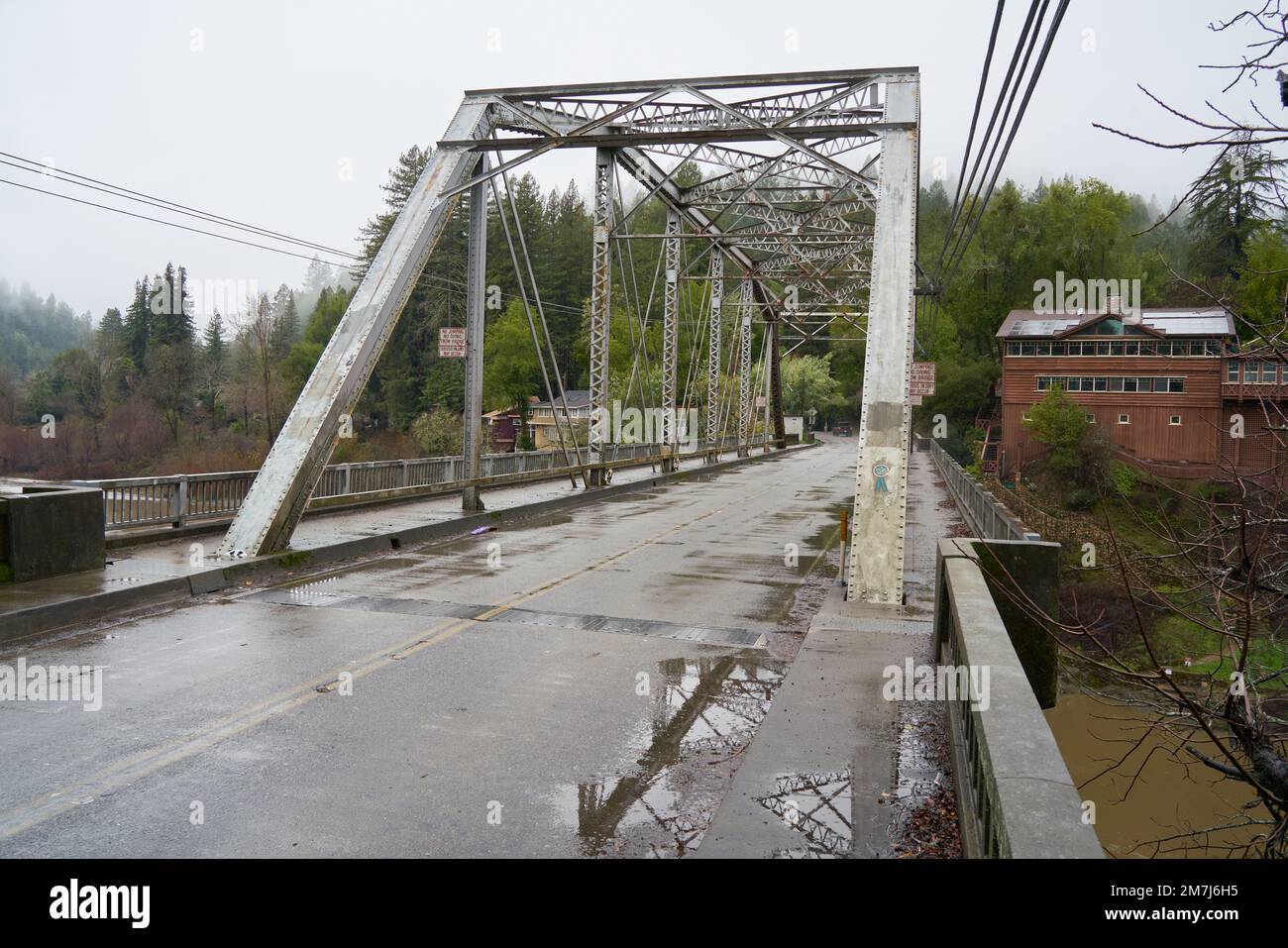 Historic Hacienda Bridge over the Russian River in Forestville, California, on wet rainy day. Stock Photo