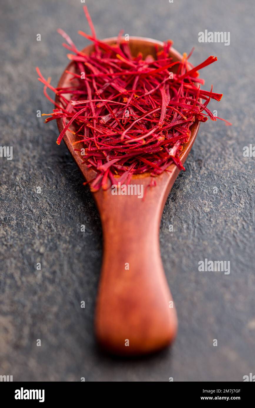 Dried saffron spice in the spoon Stock Photo Alamy