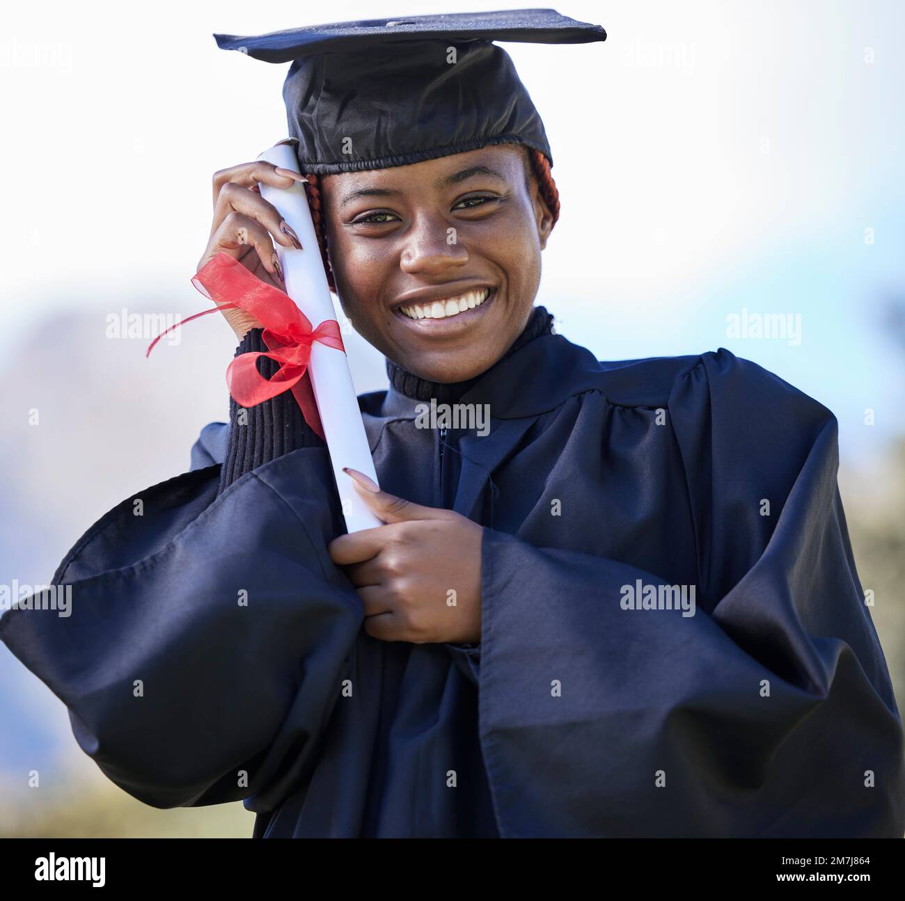 Graduate, certificate with education and black woman portrait, university success and graduation with achievement. Student in graduation cap outdoor Stock Photo
