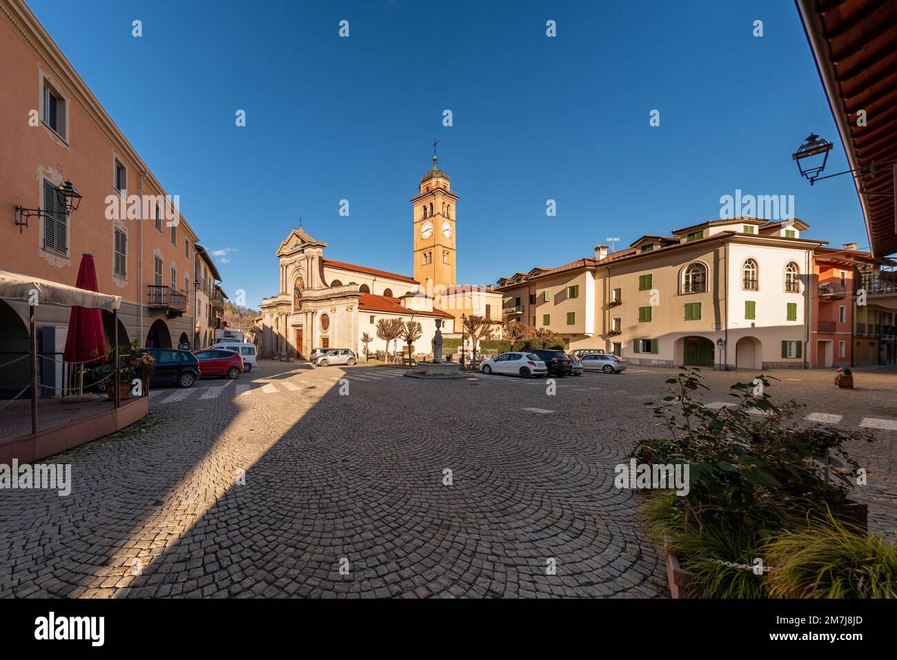 Peveragno; Cuneo; Italy - January 09; 2023: landscape of Piazza Santa Maria with the parish church of Santa Maria Stock Photo
