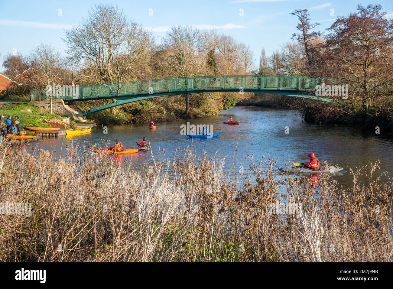 Canoeists kayaking on the river Avon in the Warwickshire town of Warwick Stock Photo