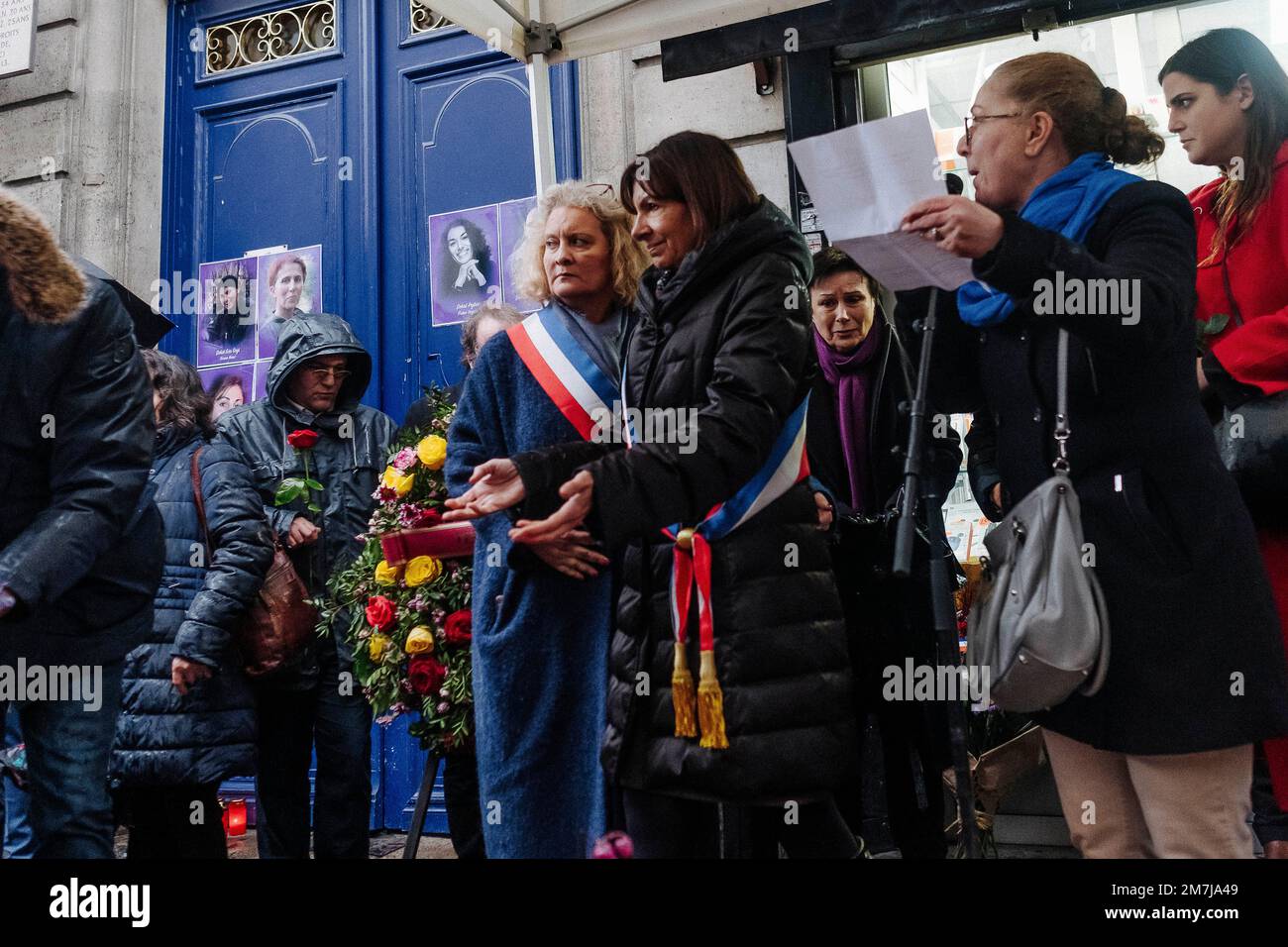 Jan Schmidt-Whitley/Le Pictorium - Commemoration of the 10th anniversary of the murder of 3 Kurdish women activists in Paris in January 2013 - 9/1/2023 - France/Paris/Paris - Anne Hidalgo will lay a wreath in front of the door of 147 rue Lafayette with the mayor of the 10th arrondissement, Alexandra Cordebard (left) and Berivan Firat, spokesperson for external relations of the Kurdish Democratic Council in France (CDKF). Several dozen Kurdish activists and their supporters gathered in front of 147 rue Lafayette to pay tribute to the three Kurdish activists murdered on 9 January 2013. Stock Photo