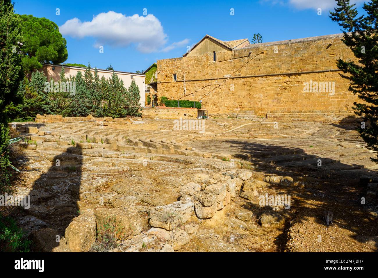 Ekklesiasterion and Oratorium of Phalaris. The Ekklesiasterion was the building in which the meeting of the ekklesia (the people assembly) were house and it was close to the sacred complex of the Chthonic deities. Stock Photo