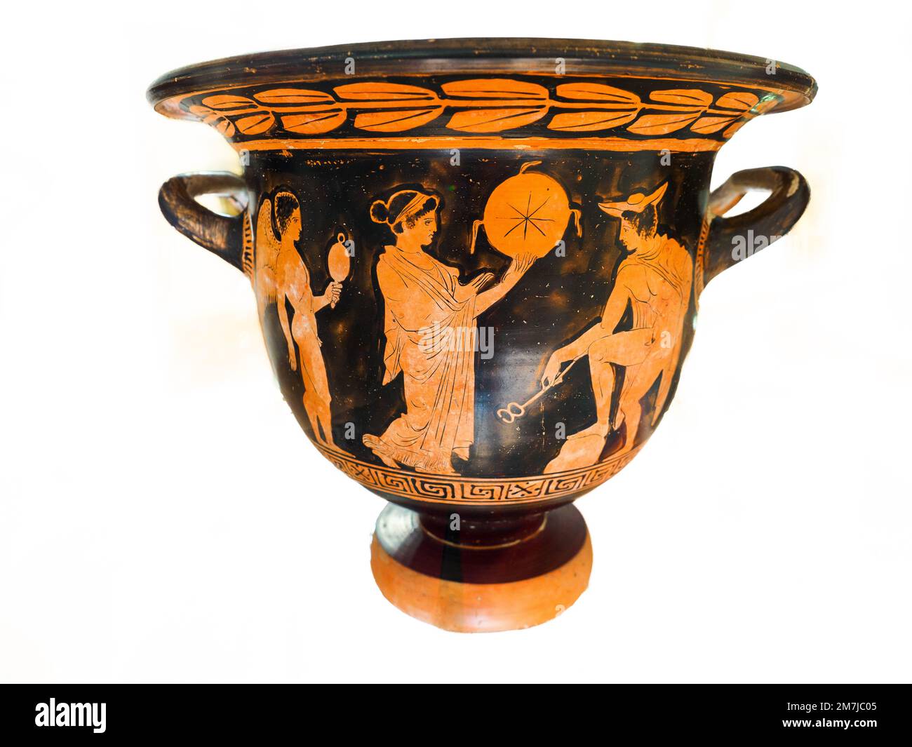 Apulian bell crater in red figure, circa 400 BC, attributed to the Hearst Painter. A woman dressed in chiton and himation with a disk in her left hand moves towards Hermes followed by a cupid (Eros) holding a mirror. Hermes, with his chlamys, caduceus and petasos, rests his right leg on a rocky outcrop. - Archaeological Museum 'Pietro Griffo' of Agrigento - Sicily, Italy Stock Photo