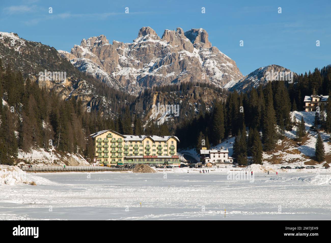 AURONZO DI CADORE, ITALY - DECEMBER 29, 2022: View of Misurina lake in winter season with snow, the largest natural lake of the Cadore and it is above Stock Photo