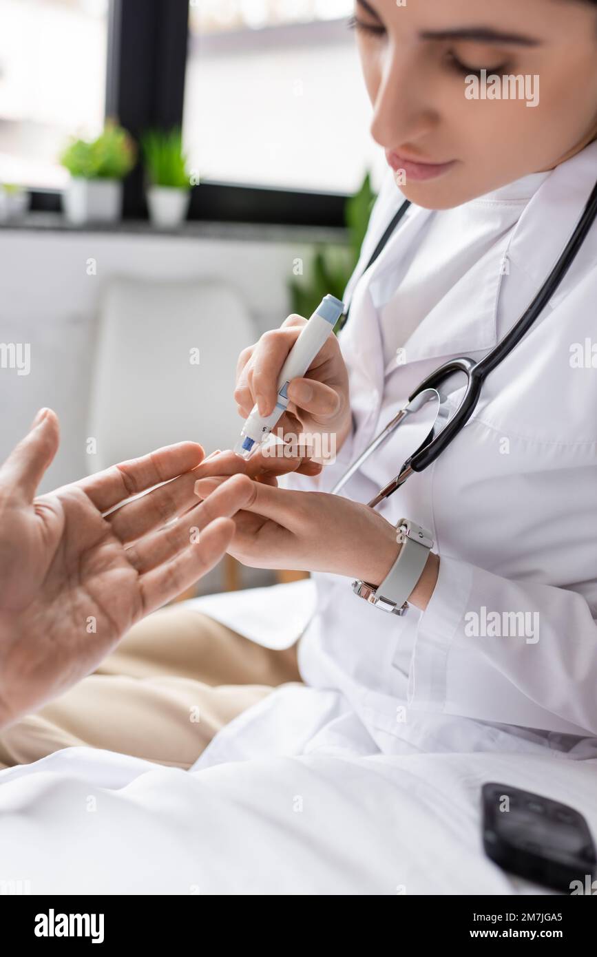 Doctor checking patient hospital ward hi-res stock photography and ...
