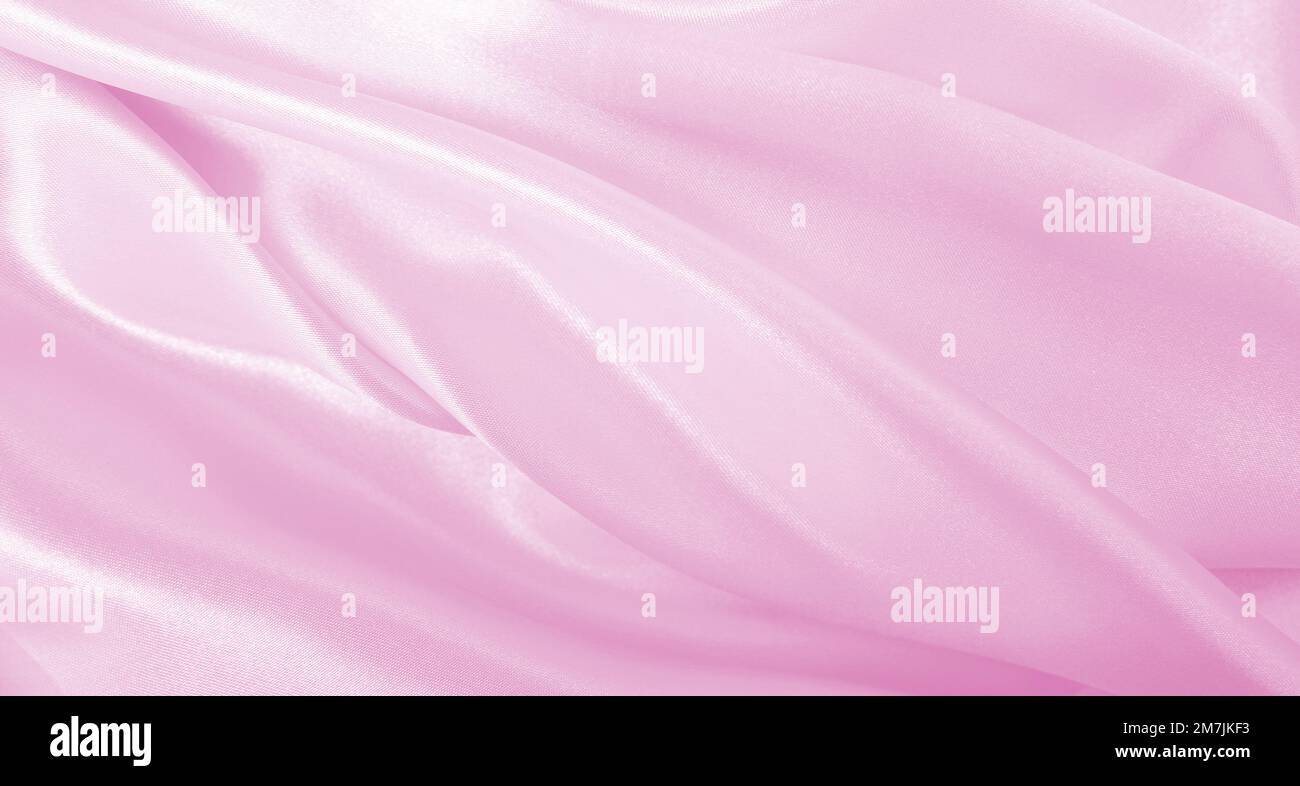 Smooth elegant pink silk or satin texture can use as wedding background ...