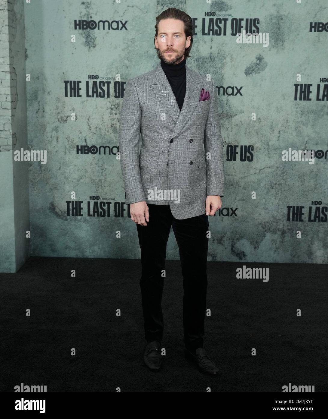 Troy Baker arrives at HBO's THE LAST OF US Premiere held at the Regency  Village Theater in Westwood, CA on Monday, ?January 9, 2023. (Photo By  Sthanlee B. Mirador/Sipa USA Stock Photo 