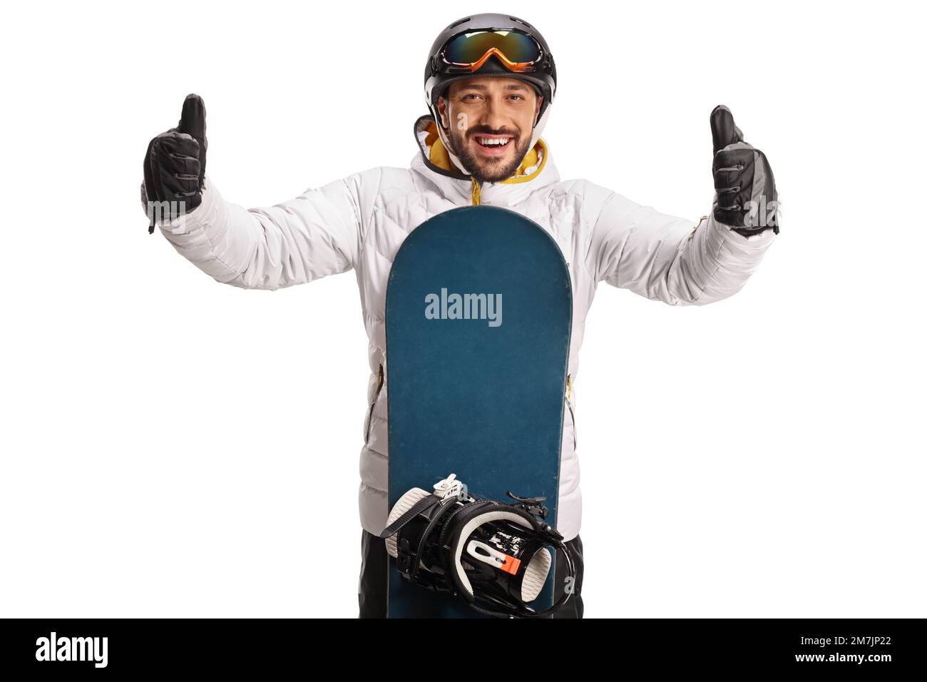 Young man with a snowboard gesturing with both thumbs up isolated on ...