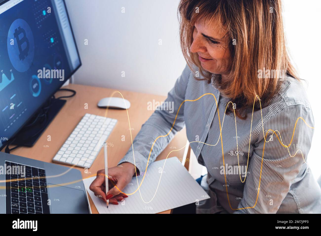 Mature business woman working with stock market Stock Photo Alamy