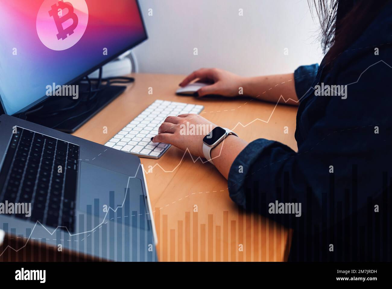 Unrecognizable business woman working on the computer, graphics added to the photo Stock Photo