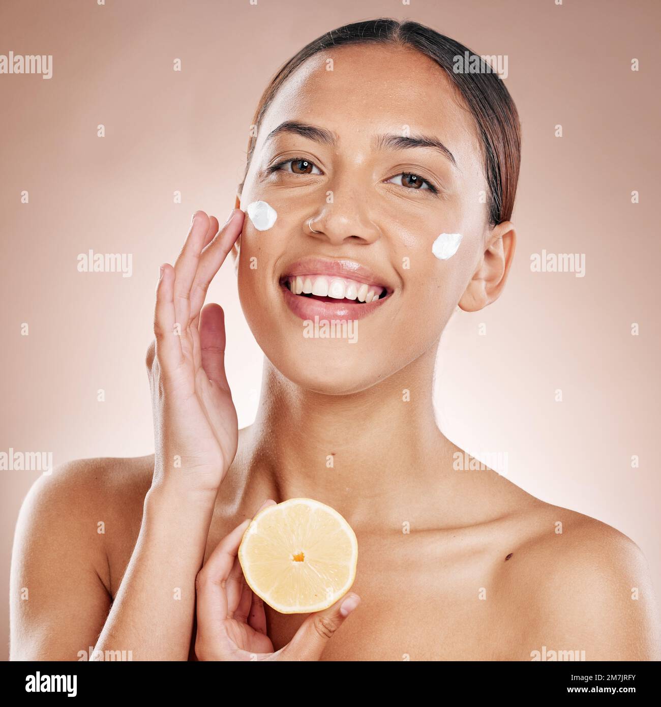 Face, cream and woman with lemon for natural beauty, cosmetics or