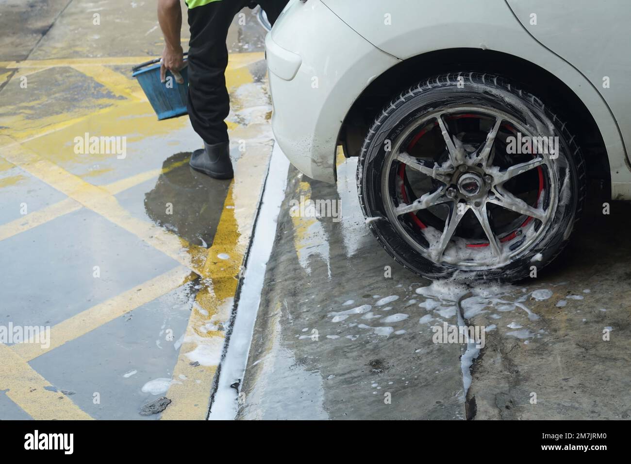 A spray foam car wash on body car to washing Stock Photo Alamy