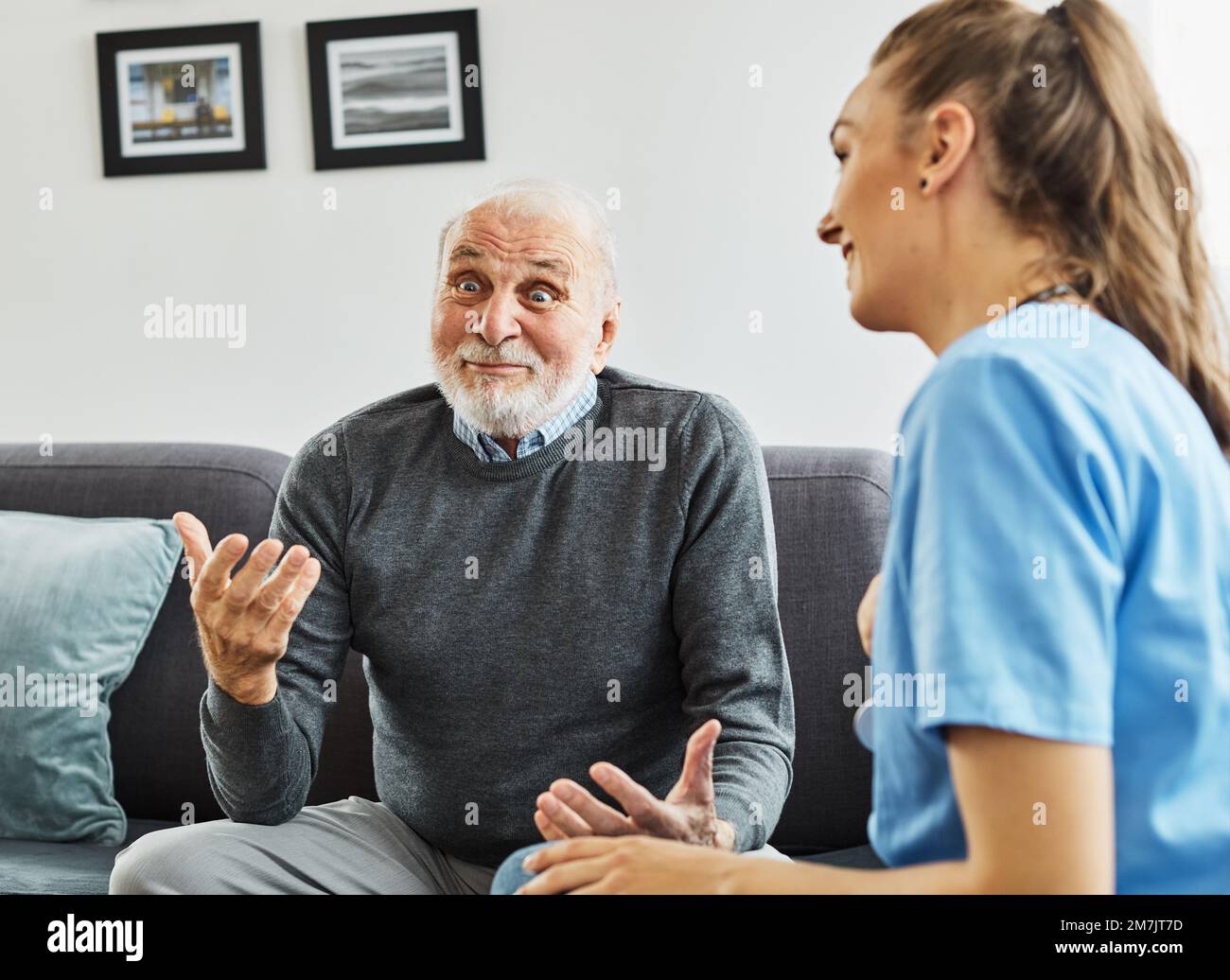 nurse doctor senior care caregiver help assistence retirement home nursing elderly sad depression alone loneliness health support Stock Photo