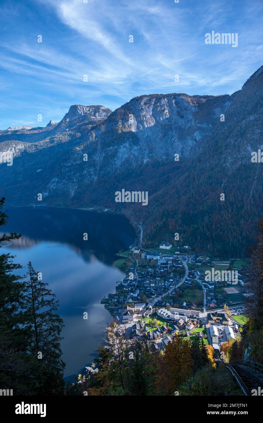 Aerial view of the picturesque Hallstatt village with traditional chalet wooden houses captured from the funicular cable car at Hallstatt, Austria. Stock Photo