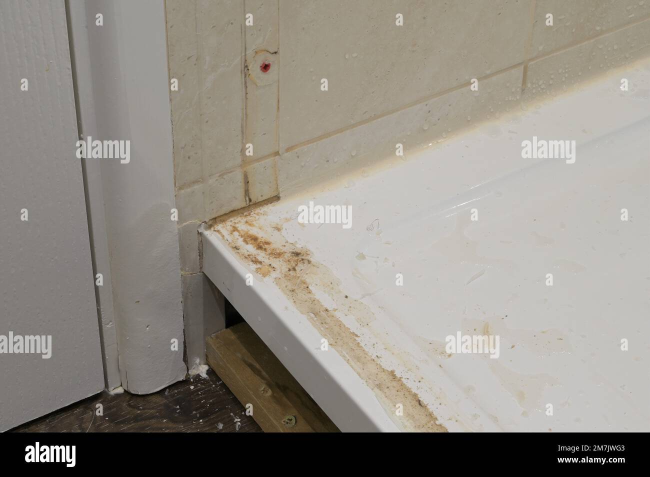 The damage where a shower cubicle has leaked. Stock Photo