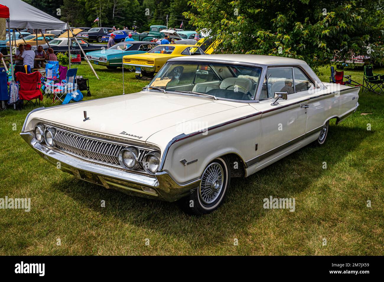 Iola, WI - July 07, 2022: High perspective front corner view of a 1964 Mercury Park Lane Marauder 2 Door Hardtop at a local car show. Stock Photo