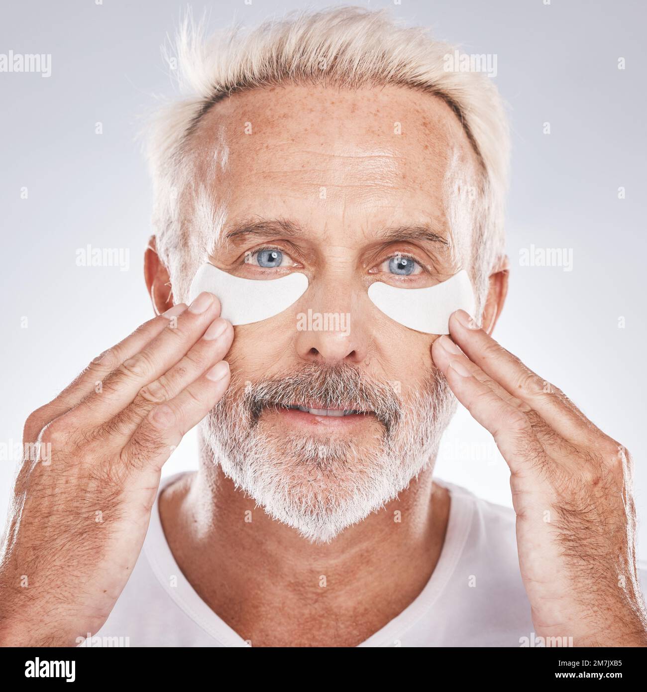 Senior man with collagen eyes mask in skincare, dermatology facial and