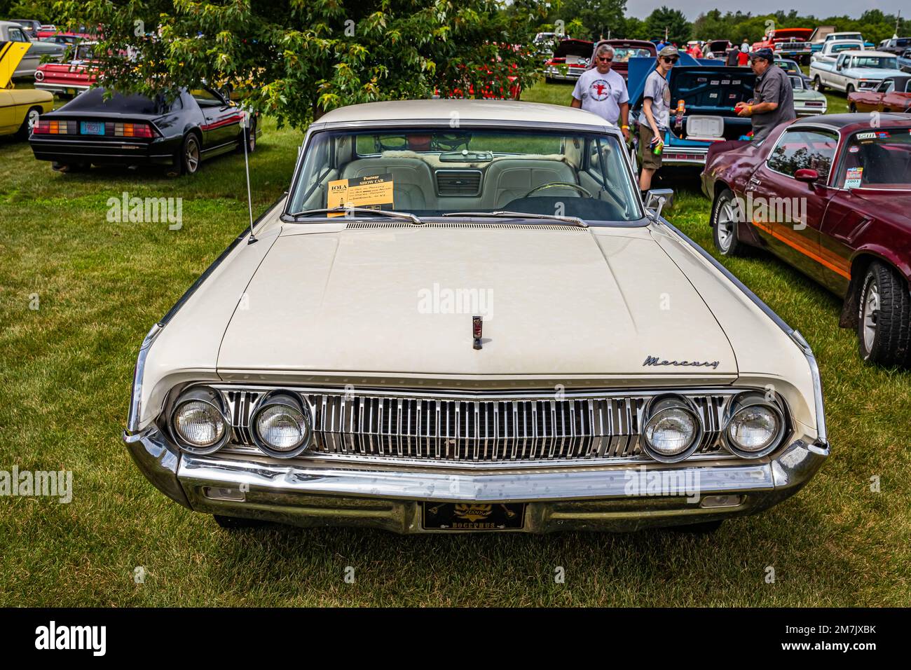 Iola, WI - July 07, 2022: High perspective front view of a 1964 Mercury Park Lane Marauder 2 Door Hardtop at a local car show. Stock Photo