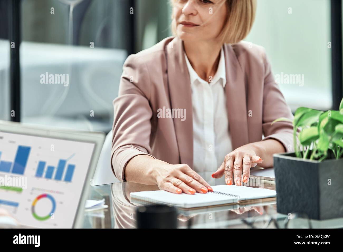 Mature woman paperwork thinking hi-res stock photography and images - Alamy
