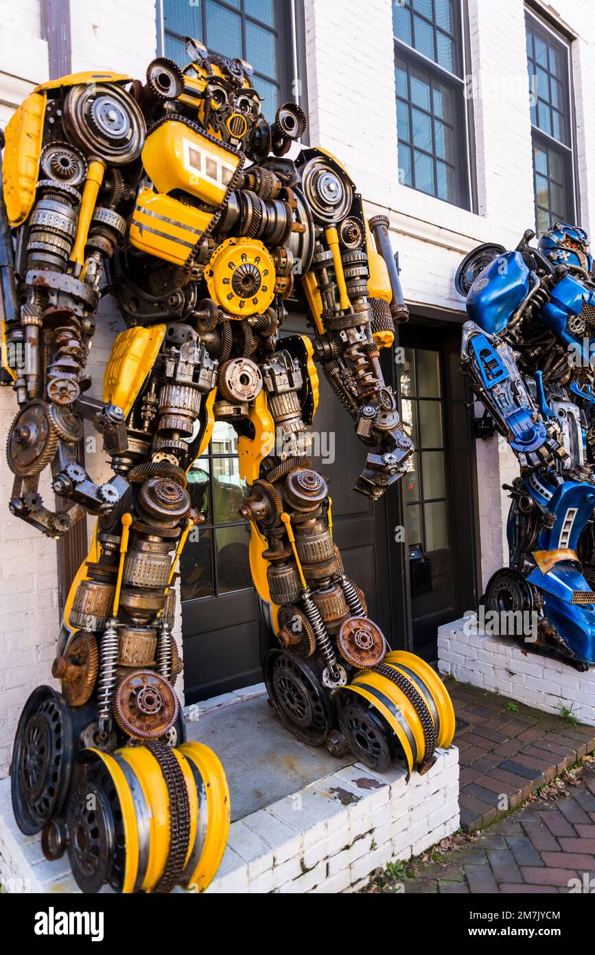 Colourful giant robot toys in a Residential street in upmarket a plush, historic