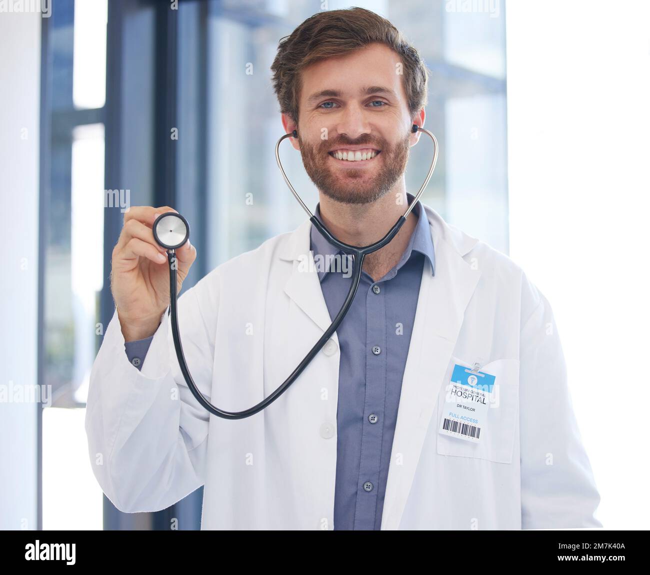 Cardiology doctor and portrait of man at hospital with expert stethoscope for medical evaluation