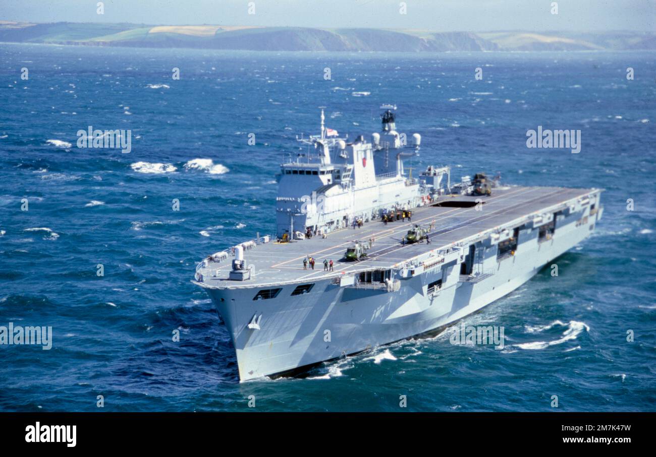 HMS Ocean was a Landing Platform Helicopter, formerly the UK's helicopter carrier and the fleet flagship of the Royal Navy. She was designed to support amphibious landing operations and to support the staff of Commander UK Amphibious Force and Commander UK Landing Force. She was constructed in the mid-1990s by Kvaerner Govan on the River Clyde and fitted out by VSEL at Barrow-in-Furness prior to trials and subsequent acceptance in service. Ocean was commissioned in September 1998 at her home port HMNB Devonport, Plymouth.  In December 2017, the Brazilian Navy confirmed the purchase of the ship Stock Photo