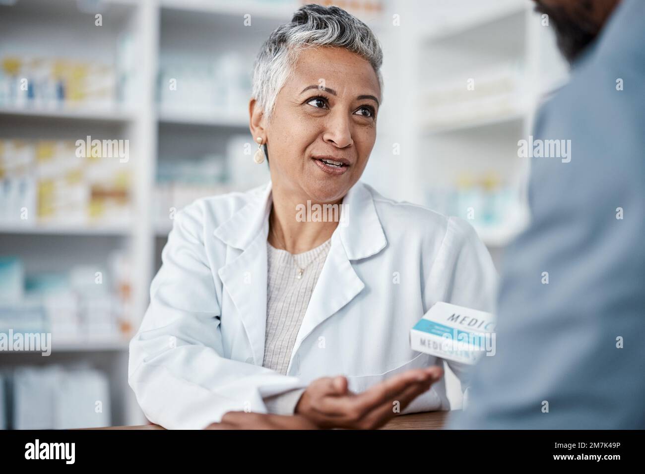 Medicine, pharmacy and pills with woman and customer in store for