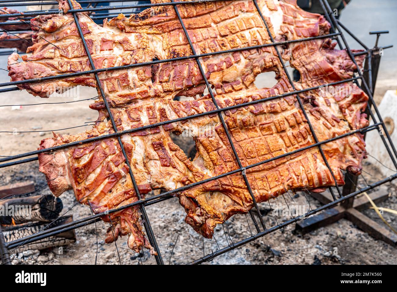 preparation of pork meat on fire, street food Stock Photo