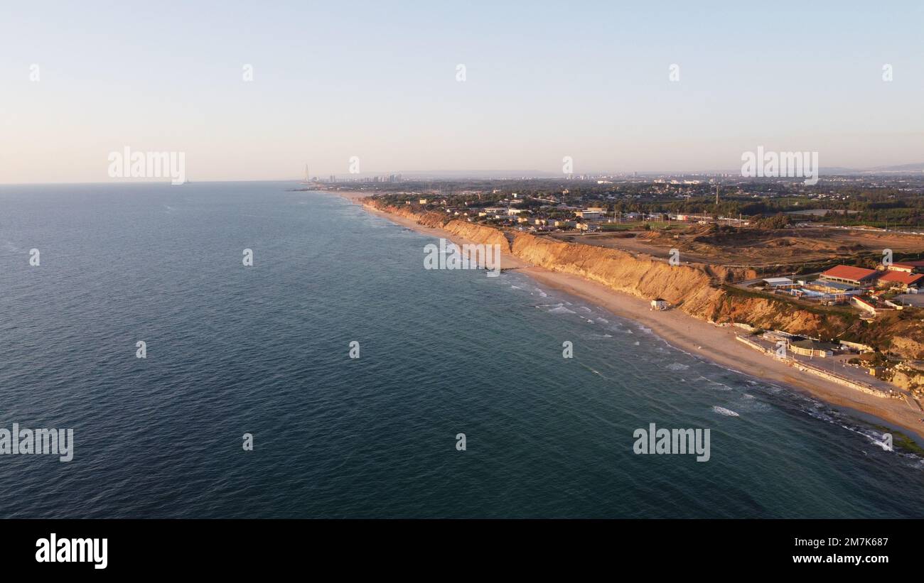 Summer sunset views of the Mediterranean sea. Clear blue sky with aerial capture Stock Photo Alamy