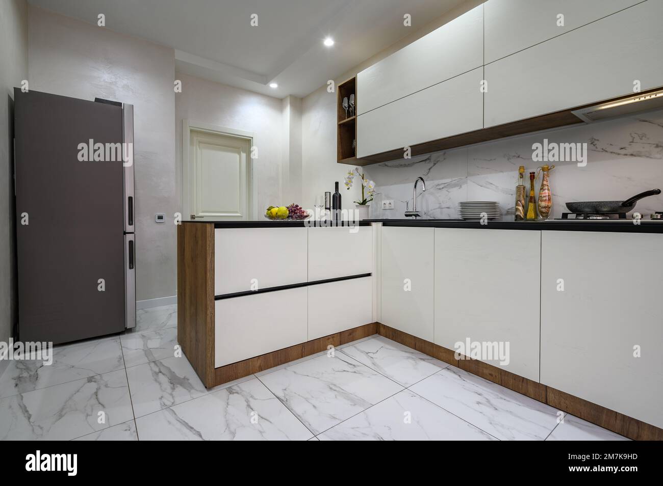 Large black and white luxury kitchen interior Stock Photo