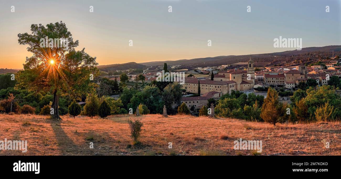 View of the town Santo Domingo de Silos at sunset. Silos Monastery in the distance from above. In the province of Burgos. Stock Photo