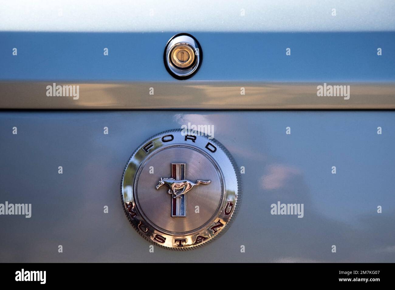 KENT, UK - SEPTEMBER 14, 2019: Boot (trunk) lock and badge of Ford Mustang American car Stock Photo