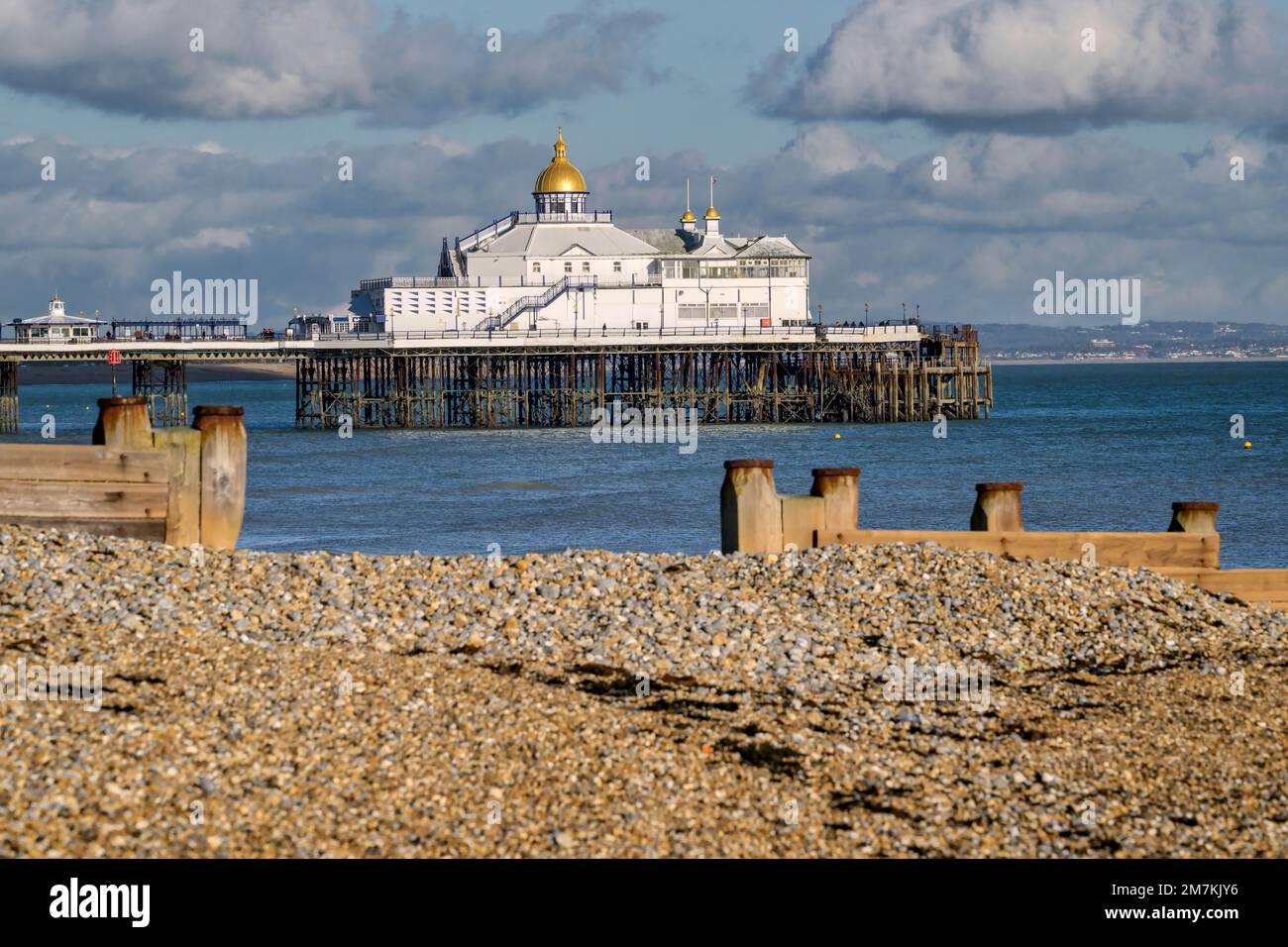Eastbourne Pier viewed from the west, with its recently-added gold roof catching the afternoon winter sunshine. Picture by Jim Holden. Stock Photo