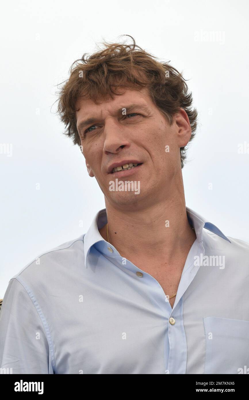 Film director Cedric Jimenez posing during the photocall of the film “Novembre” on the occasion of the Cannes Film Festival on May 23, 2022 Stock Photo