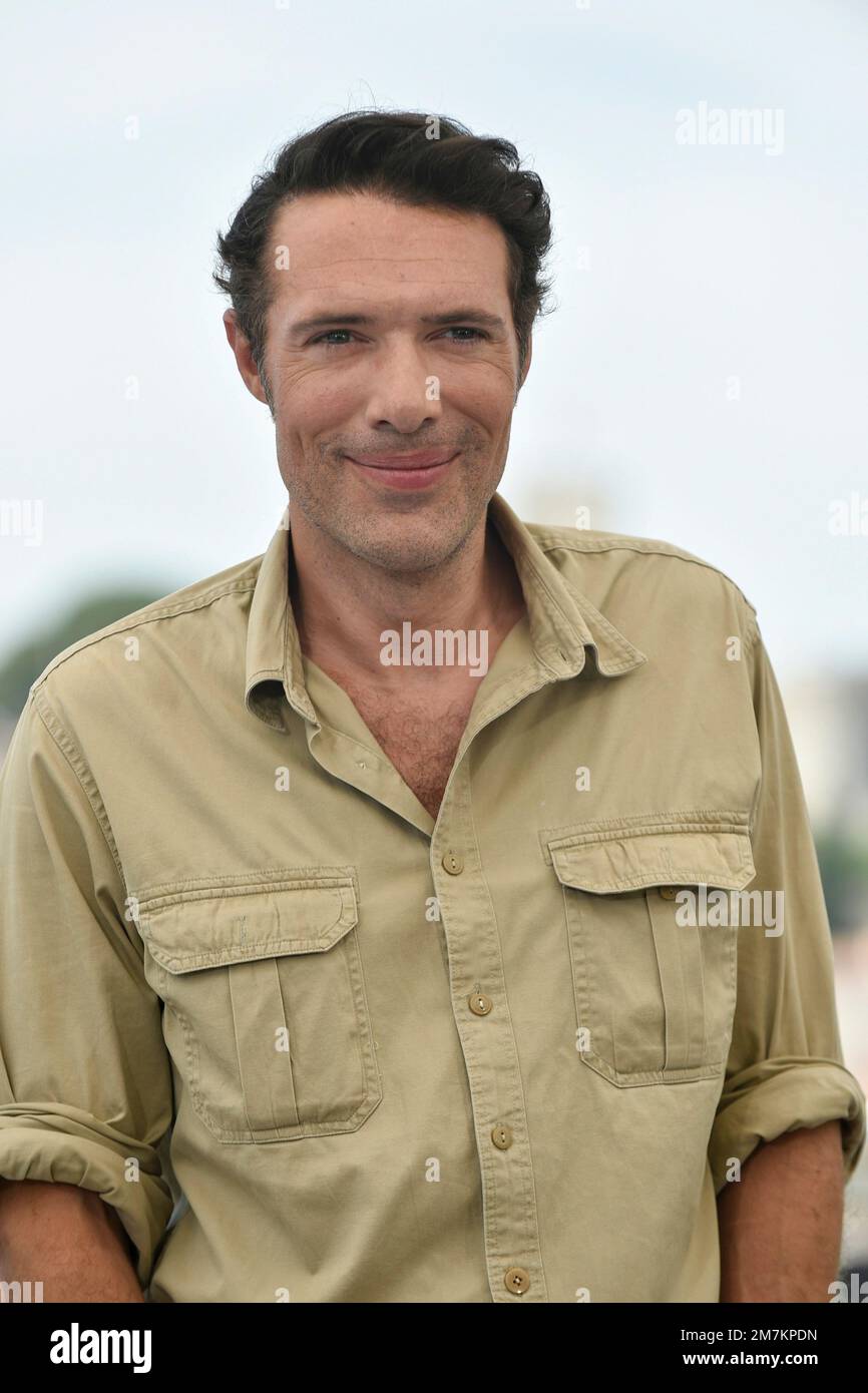 Filmmaker Nicolas Bedos posing during the photocall of the film “Mascarade”  on the occasion of the Cannes Film Festival on May 28, 2022 Stock Photo -  Alamy